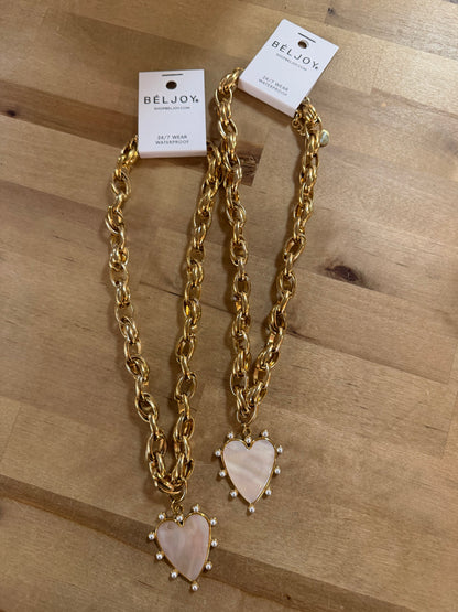 Two gold chunky chain necklaces with pearl-trimmed mother-of-pearl heart pendants