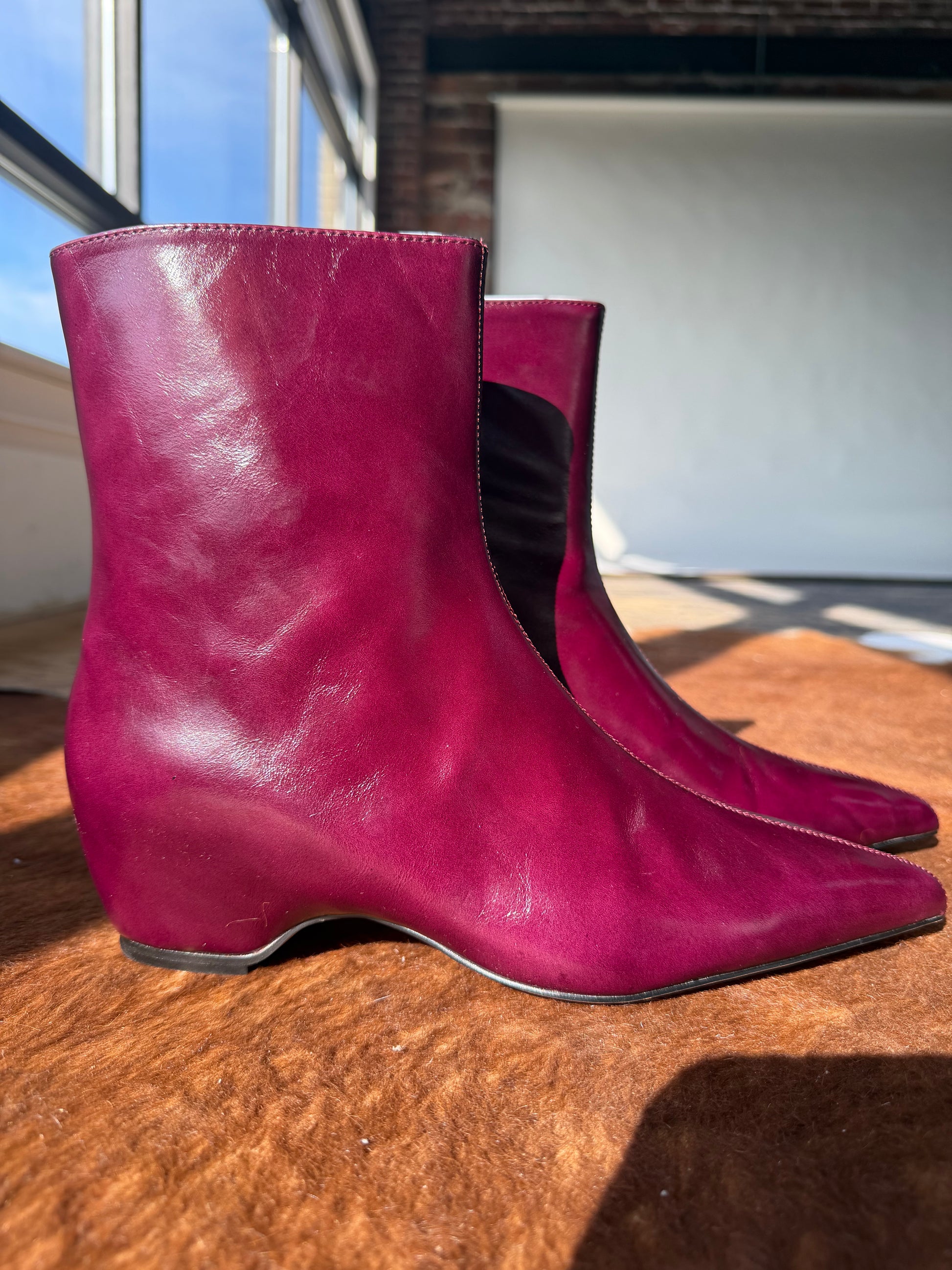 Steve Madden maroon leather ankle booties with pointed toe and wedge heel