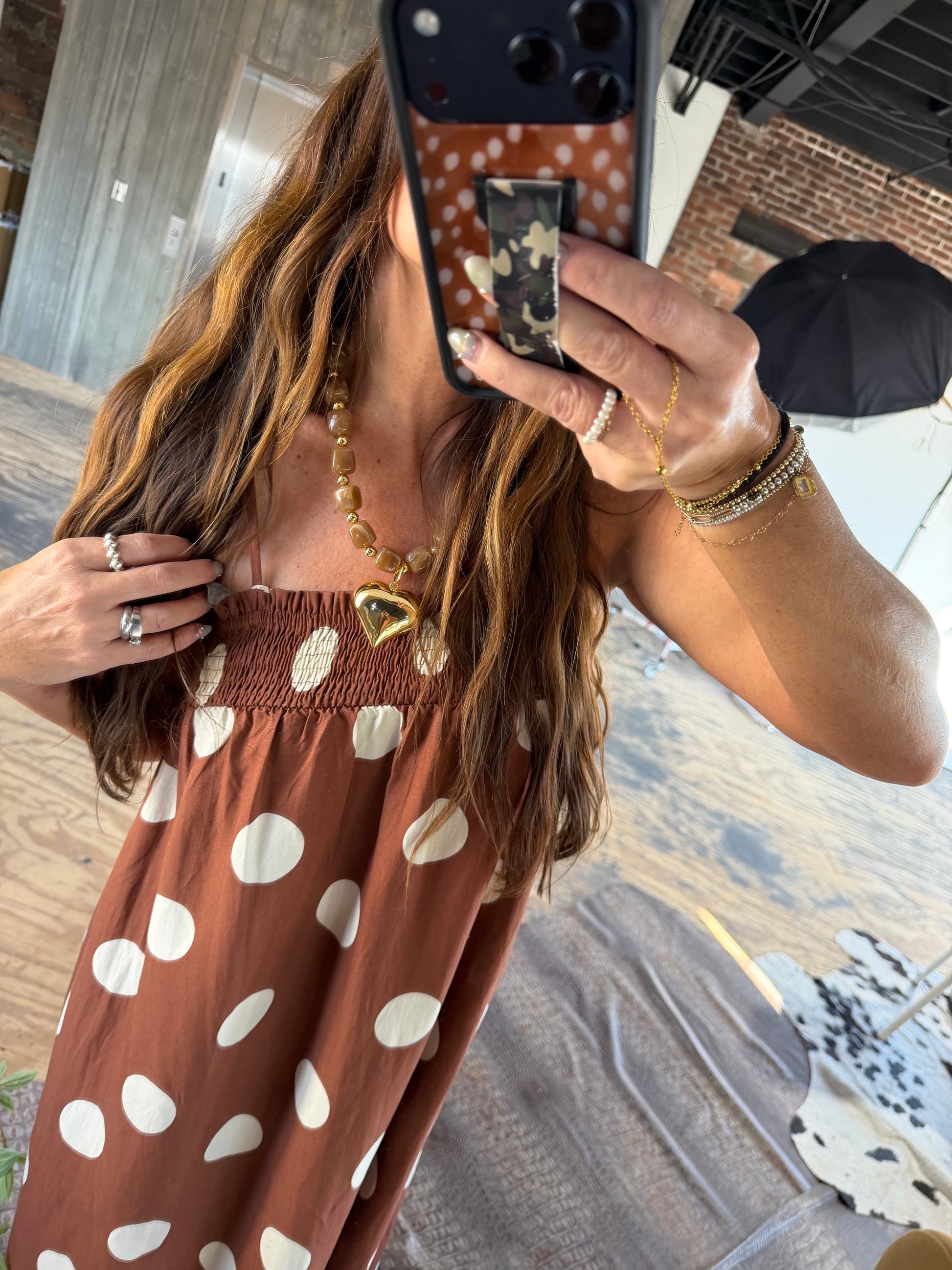 Rust brown polka dot maxi dress with smocked bodice and adjustable straps