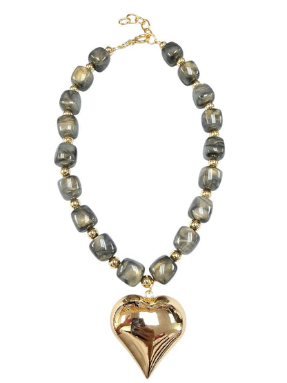 Chunky gray marbled beaded necklace with gold spacers and large puffy gold heart pendant