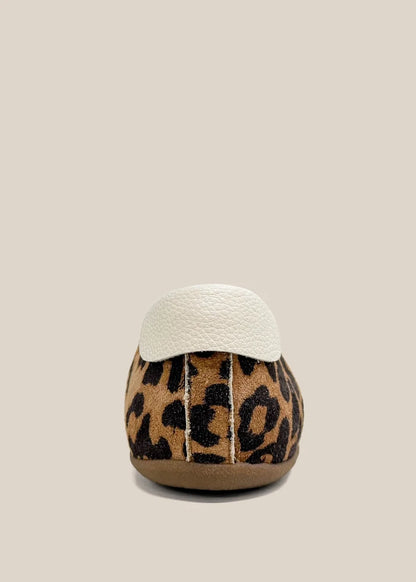 Leopard print ballet sneaker heel view with white leather collar and tan sole