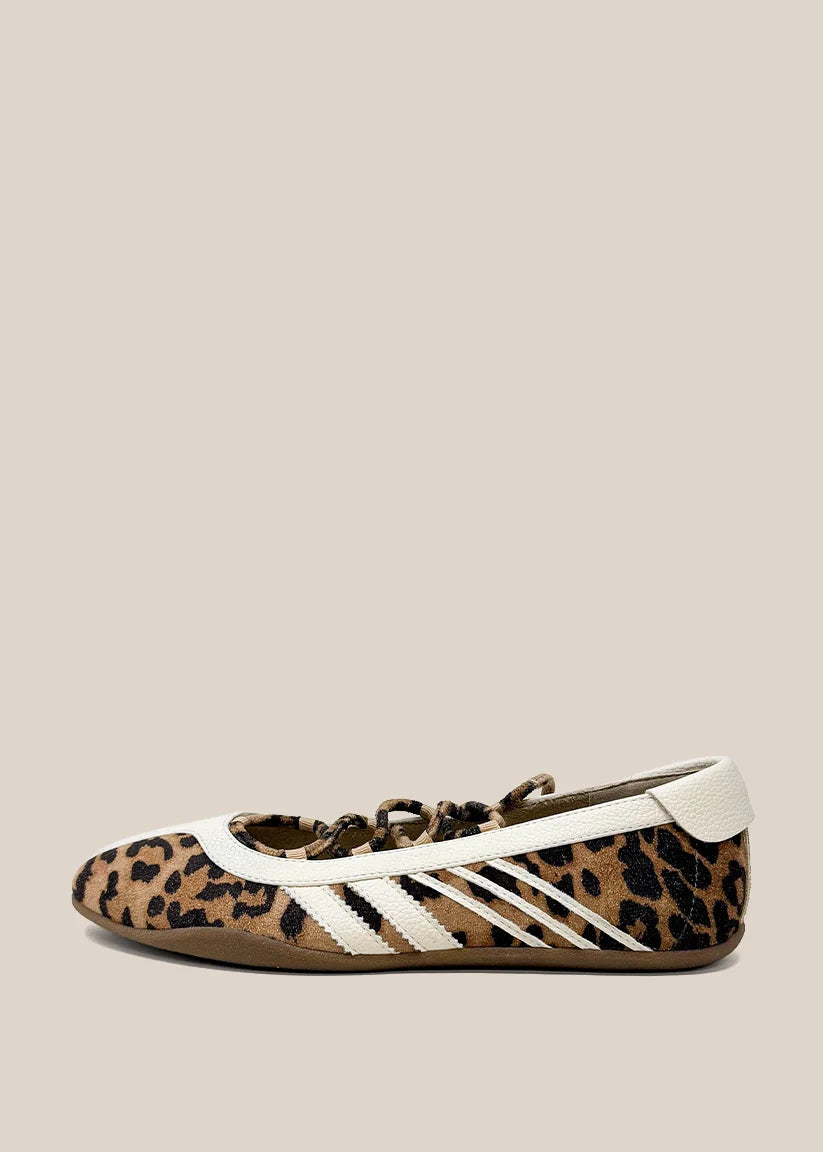 Leopard print ballet flat sneaker with white three-stripe detail and lace-up front