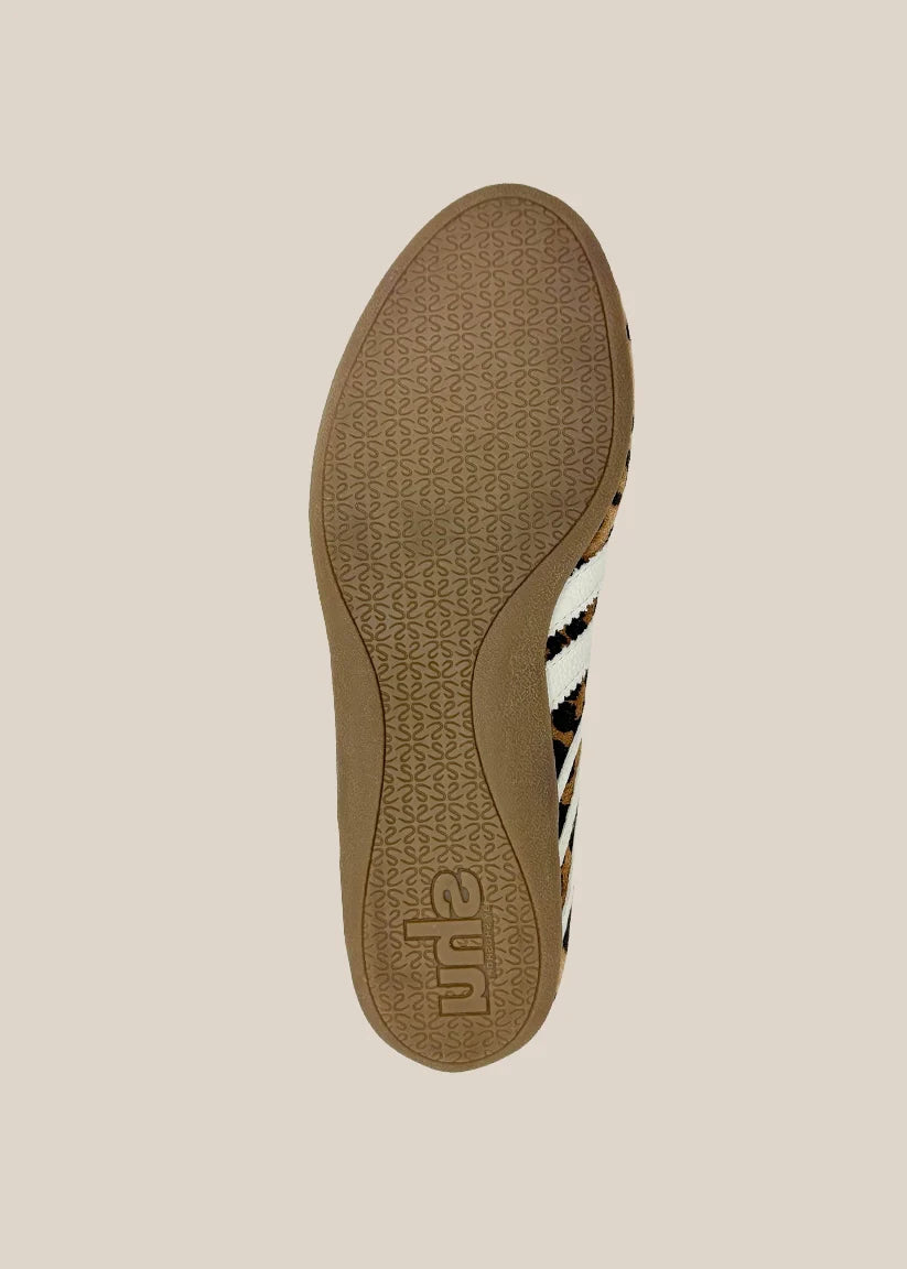Bottom sole view of leopard print lace-up ballet sneaker with gum rubber outsole