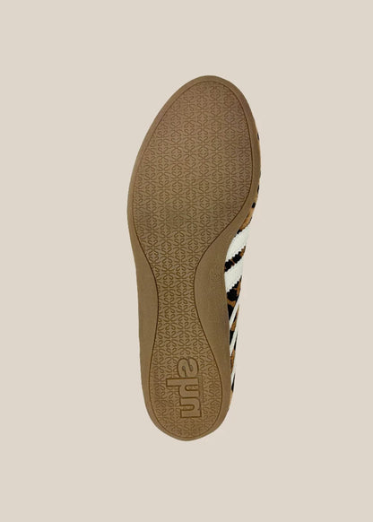 Bottom sole view of leopard print lace-up ballet sneaker with gum rubber outsole