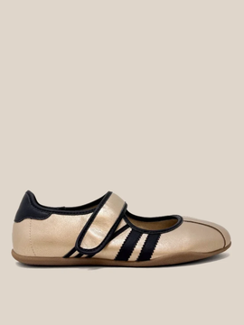 Gold metallic Mary Jane flat sneaker with black velcro strap and side stripes