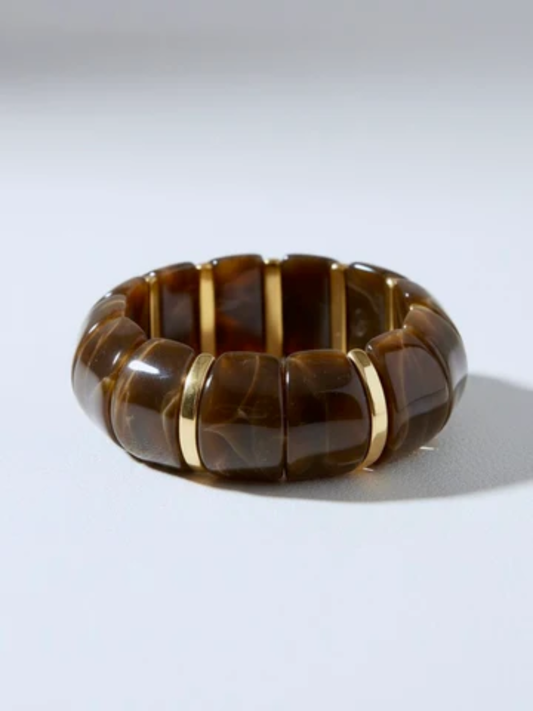 brown lucite stretch bangle bracelet with gold accents