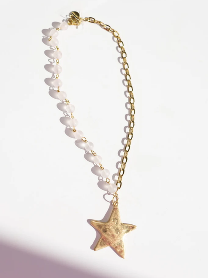 Gold star pendant necklace with frosted white beaded chain and gold curb chain