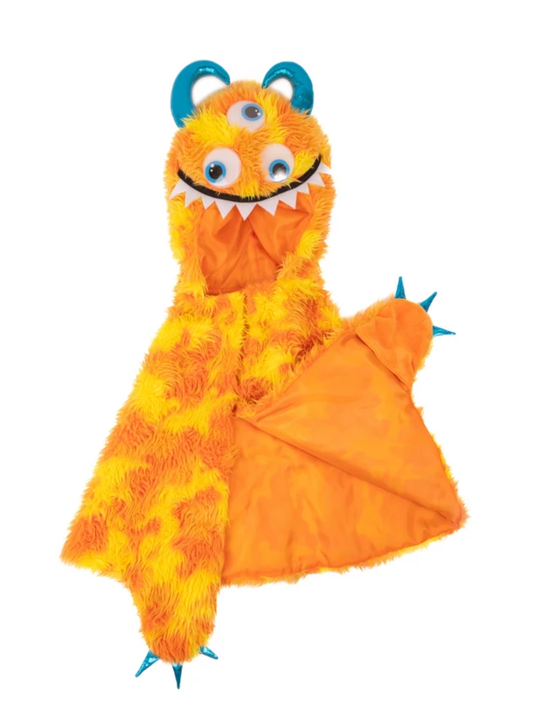 Orange fuzzy monster cape with three eyes, blue horns, and teal claws