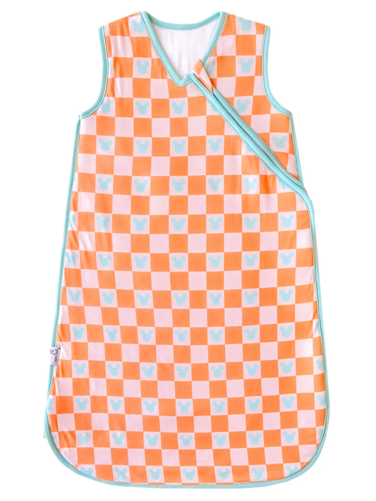 Orange checkered baby sleep bag with aqua Mickey Mouse icons and teal trim