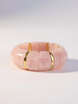 pink lucite stretch bangle bracelet with gold accents