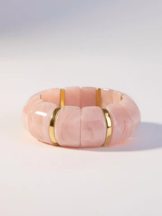 pink lucite stretch bangle bracelet with gold accents