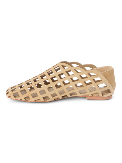 Beige suede flat shoe with diamond cutout lattice pattern and low heel