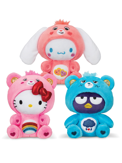 Three plush bear costume toys in pink, pink, and blue with character faces