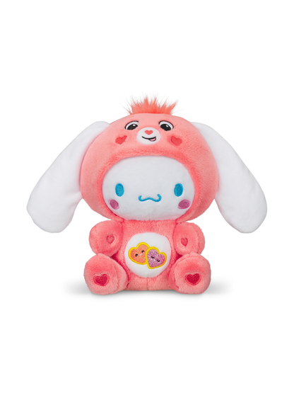 Pink plush bunny wearing a bear hoodie costume with heart embroidery details