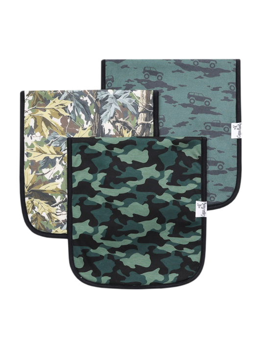 Three camouflage baby burp cloths in green, black, and woodland leaf prints