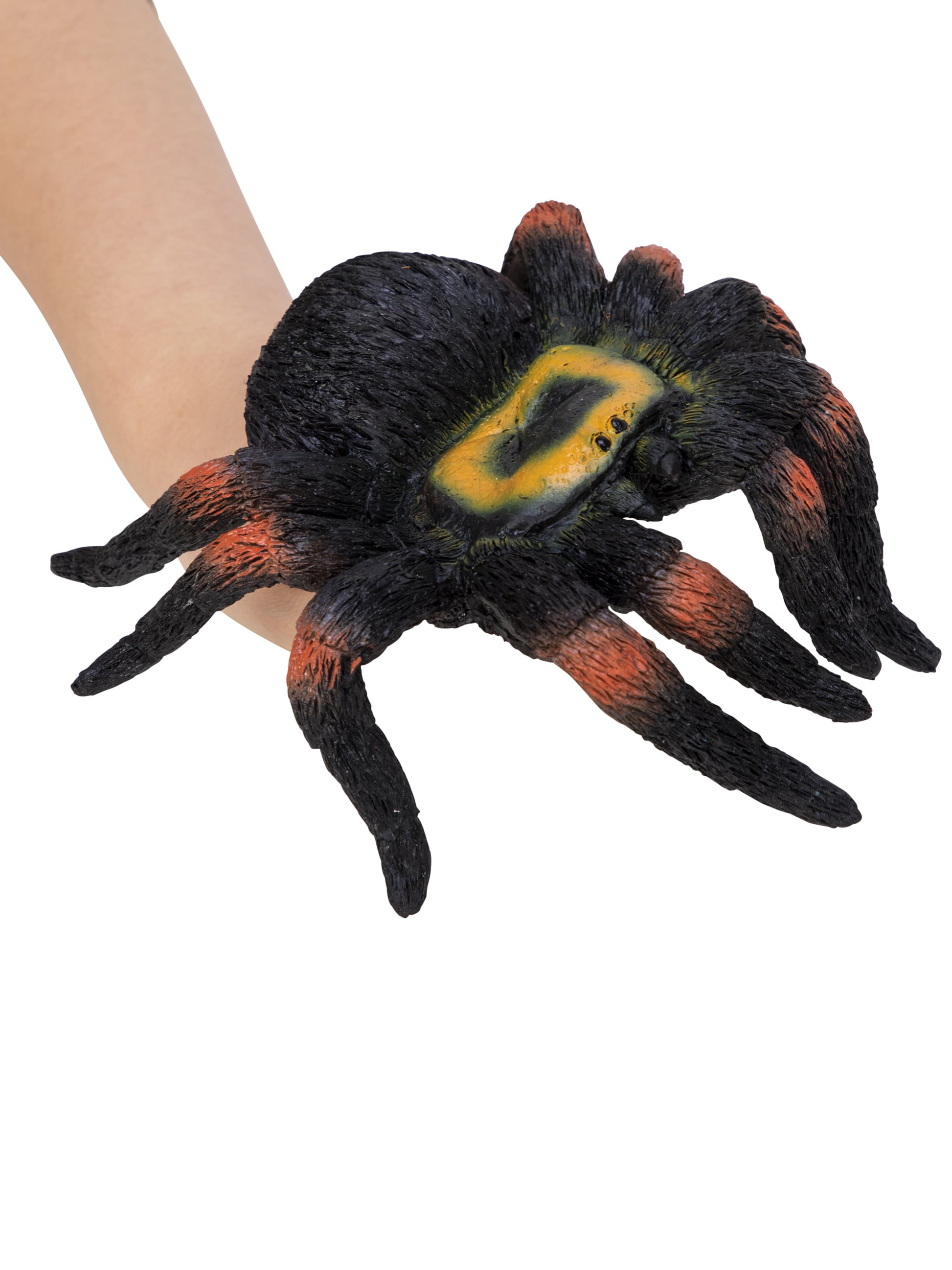 Black and orange tarantula spider hand puppet worn on a child's hand