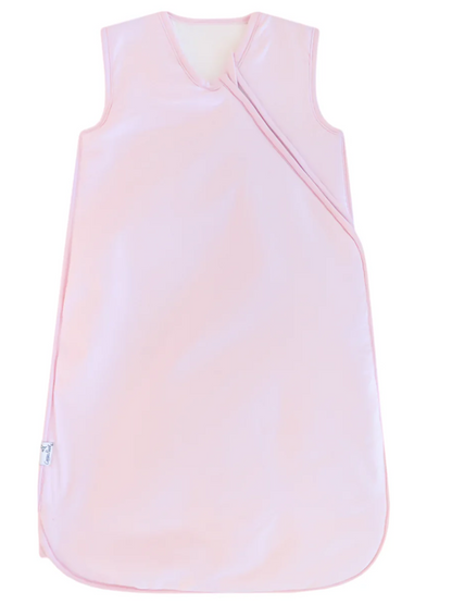 Light pink sleeveless baby sleep sack with diagonal snap closure