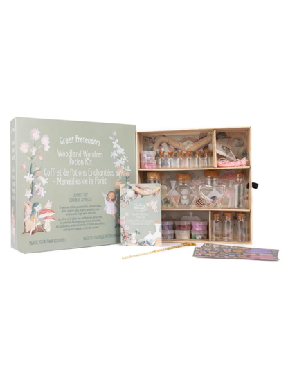 Woodland potion kit with wood shelf, glass bottles, glitter, and fairy-themed accessories