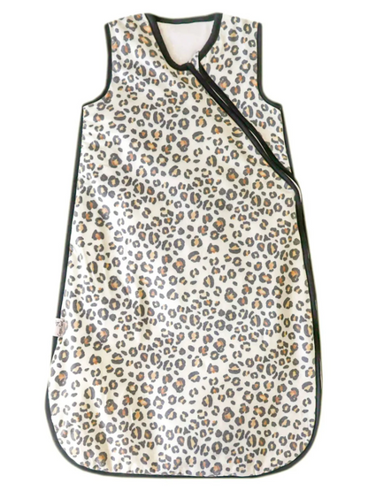 Baby sleep sack in cream leopard print with dark green trim and diagonal zipper