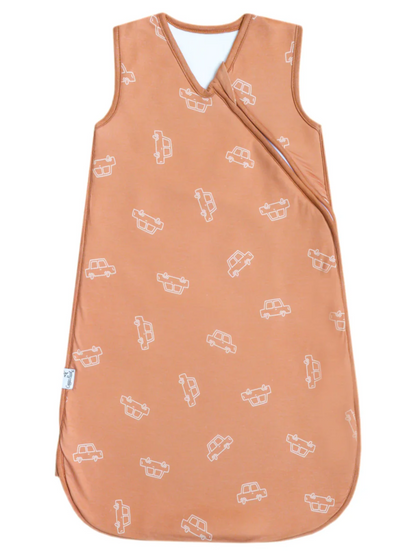 Terracotta baby sleep sack with white car pattern and wrap front closure