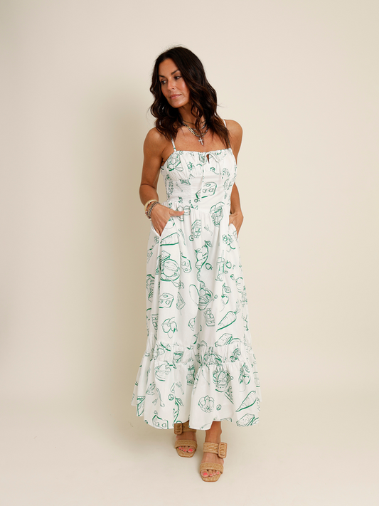 green and white printed midi dress