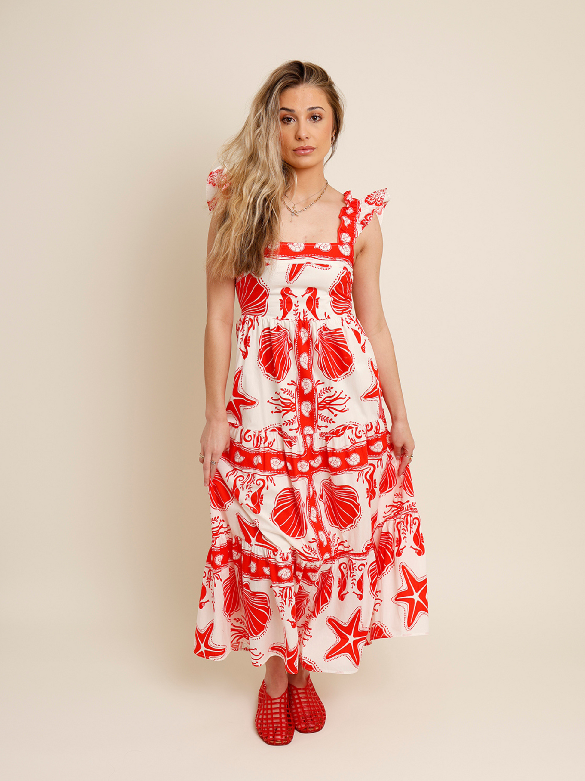 red and white mid beach print dress