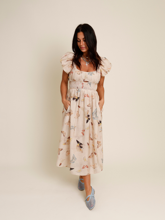 tan puff sleeve butterfly print midi dress
