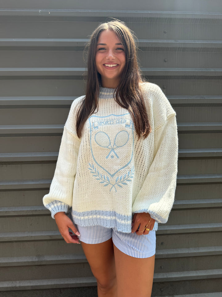 ivory and baby blue sports club sweater