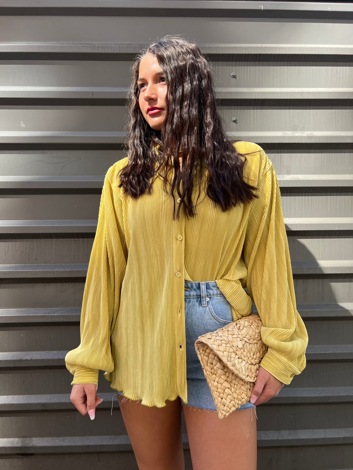 yellow pleated button up shirt