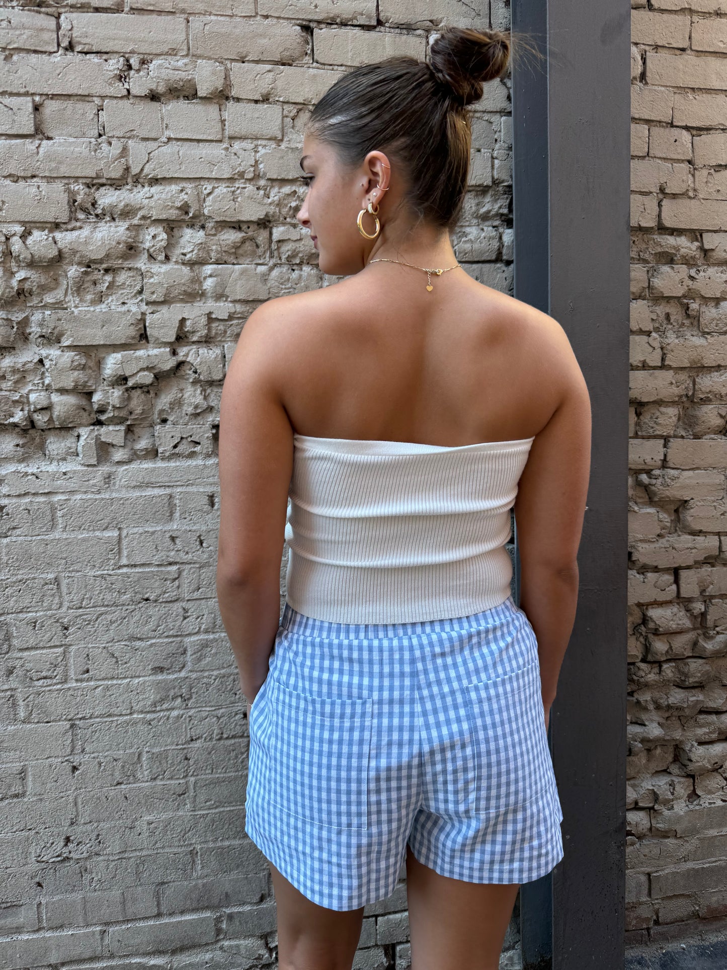 white ribbed strapless top with blue gingham print boxer shorts