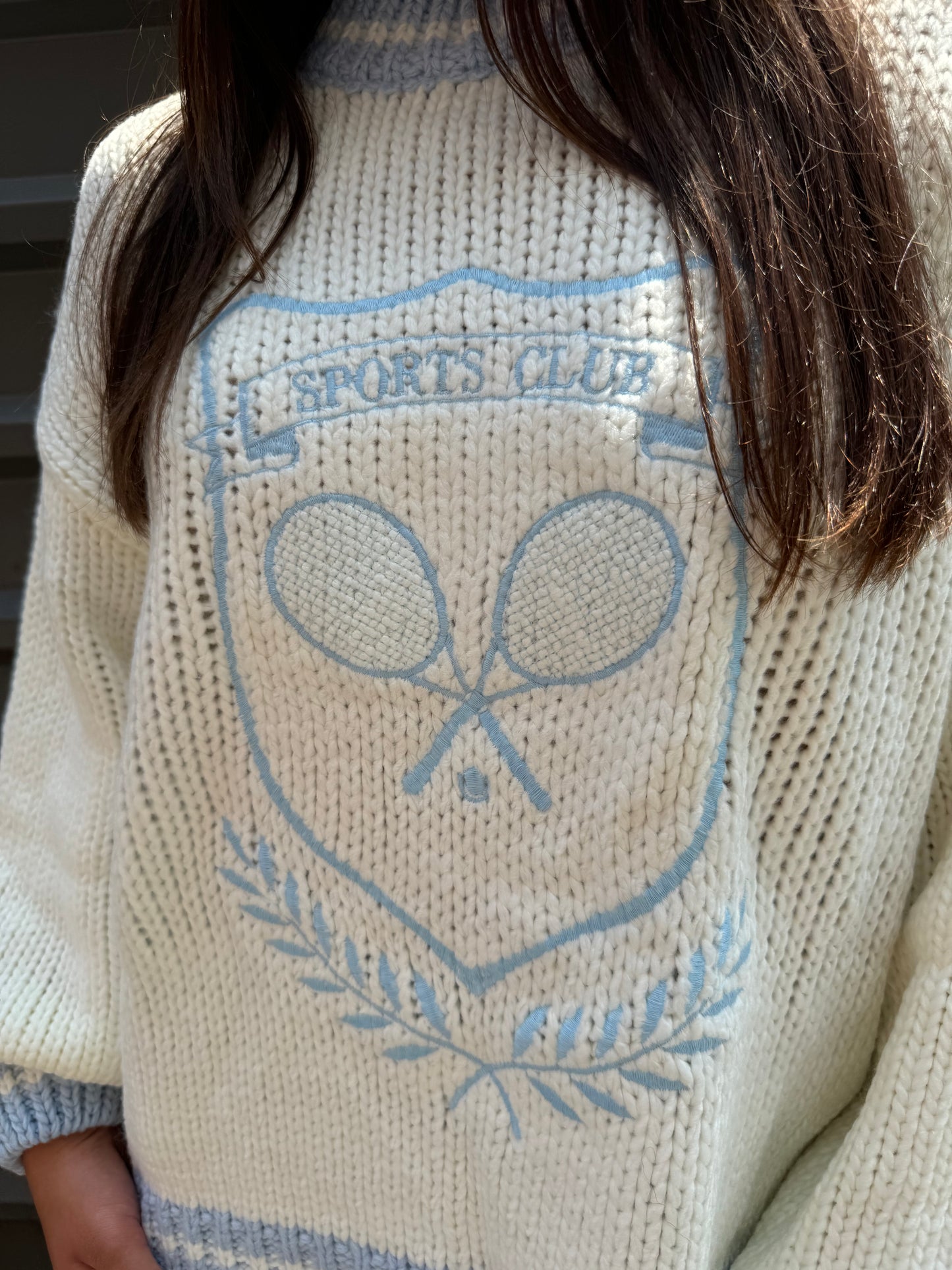 sporty crest embroidered graphic sweater