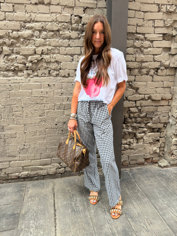 strawberry graphic tee and boxer pants outfit 