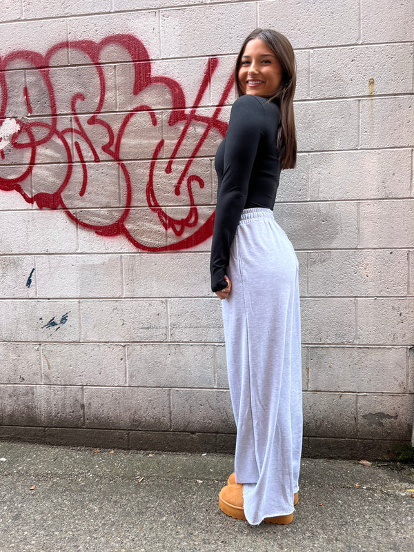 gray wide leg sweatpants with an elastic waistband