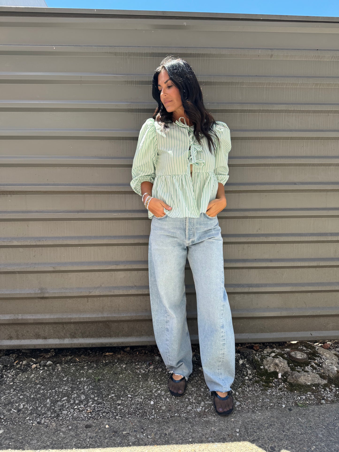 green striped puff sleeves top with front cut out bow tie details