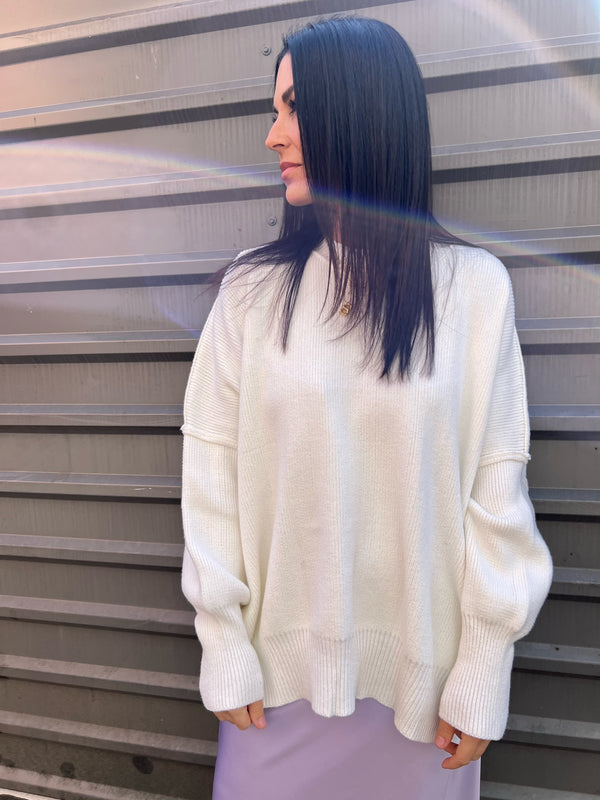 white oversized tunic sweater with balloon sleeves