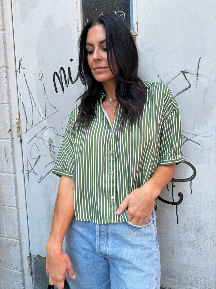 green striped short sleeve button up shirt