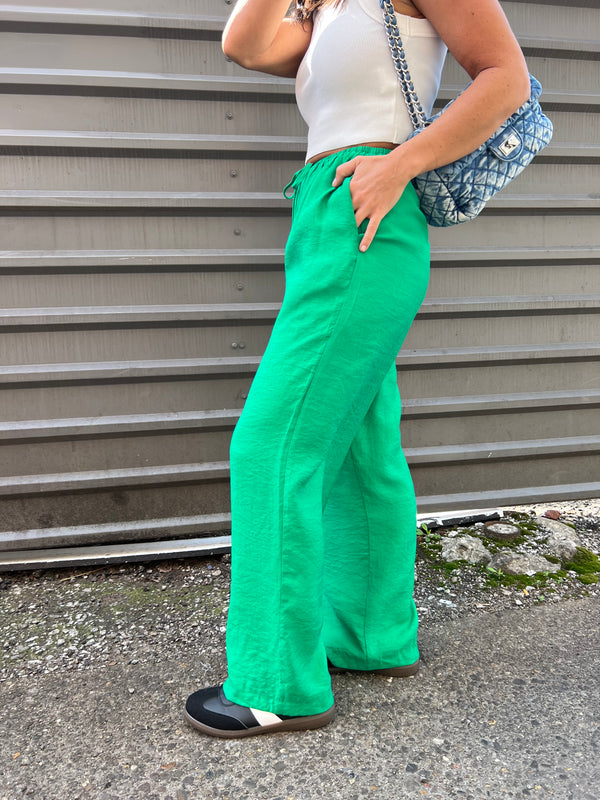 solid green tied waist flowy pants