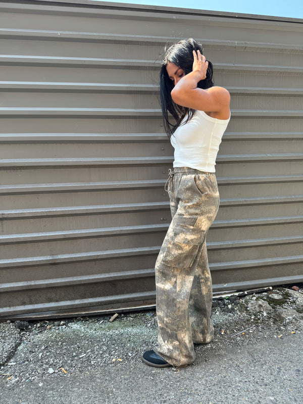 white tank and camo cargo outfits