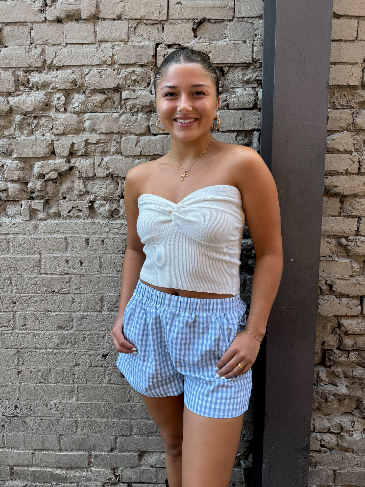 white tube top and blue gingham print boxer shorts