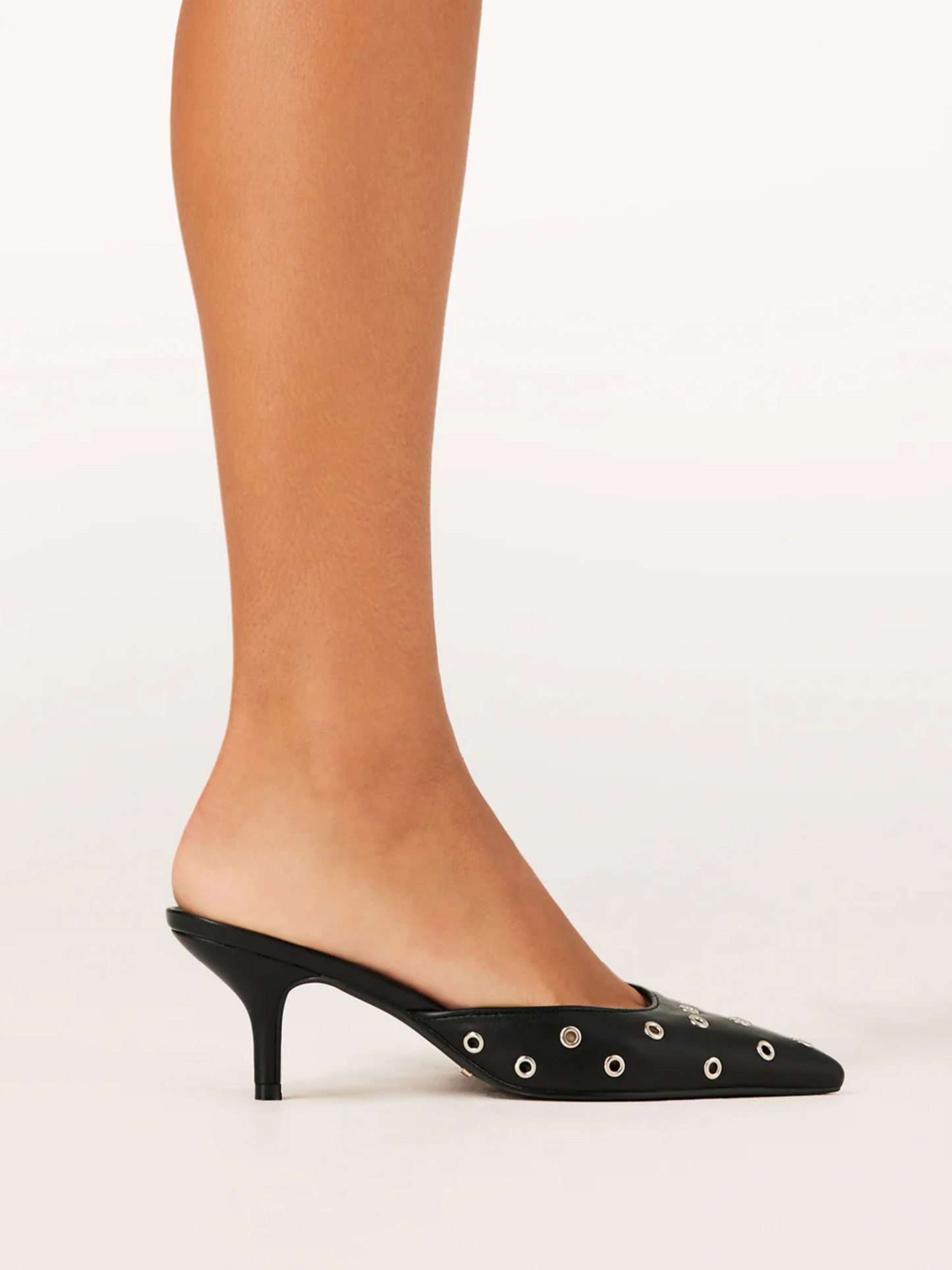 billini miles pump in black with eyelet embellishment