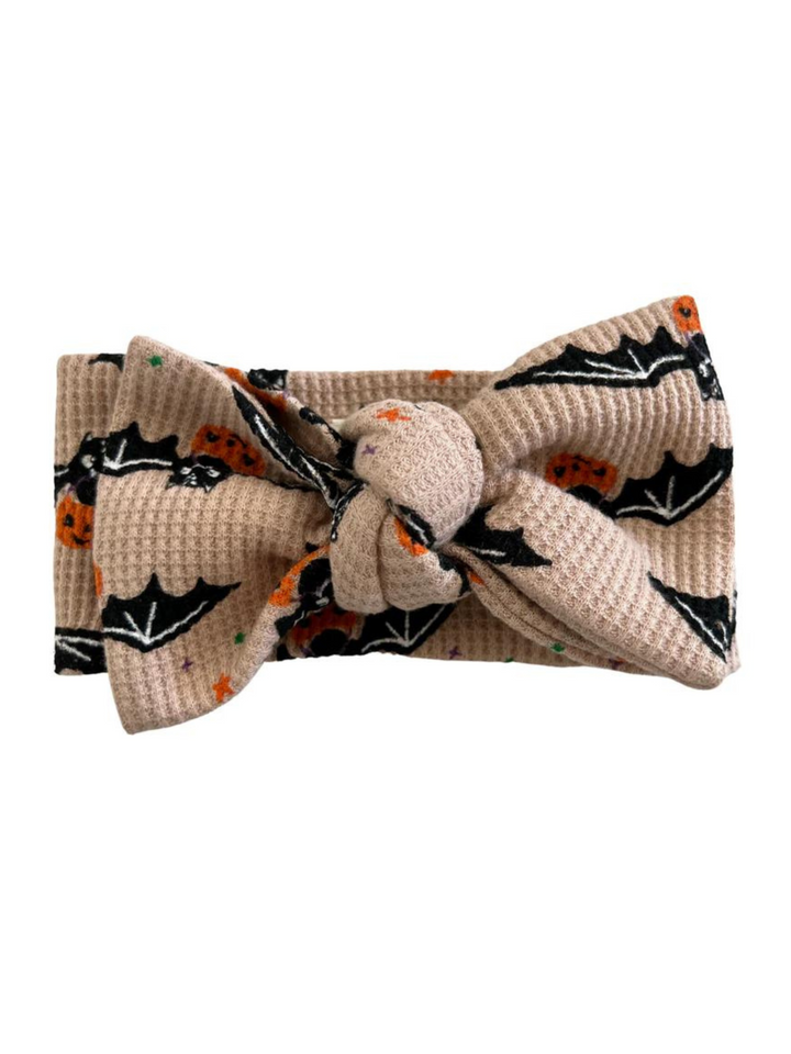ORGANIC WAFFLE KNIT HALLOWEEN HEADBAND IN TAN TRICK OR TREATING BAT - THE LITTLE EAGLE BOUTIQUE 
