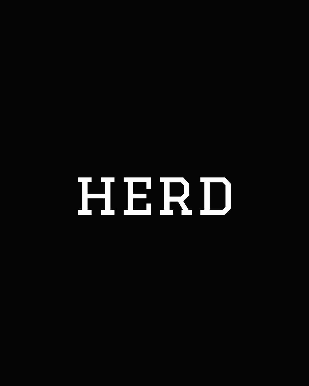 Black raglan long sleeve tee with bold white HERD text graphic on chest